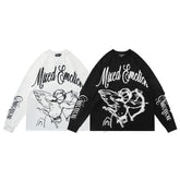 MIXED EMOTION Winged Skull Graphic Long Sleeve Top