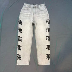 MIXED EMOTION Washed Side Graphic Denim Jeans