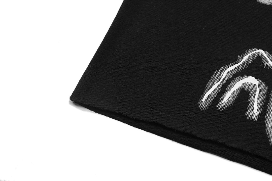 MIXED EMOTION Winged Skull Graphic Long Sleeve Top