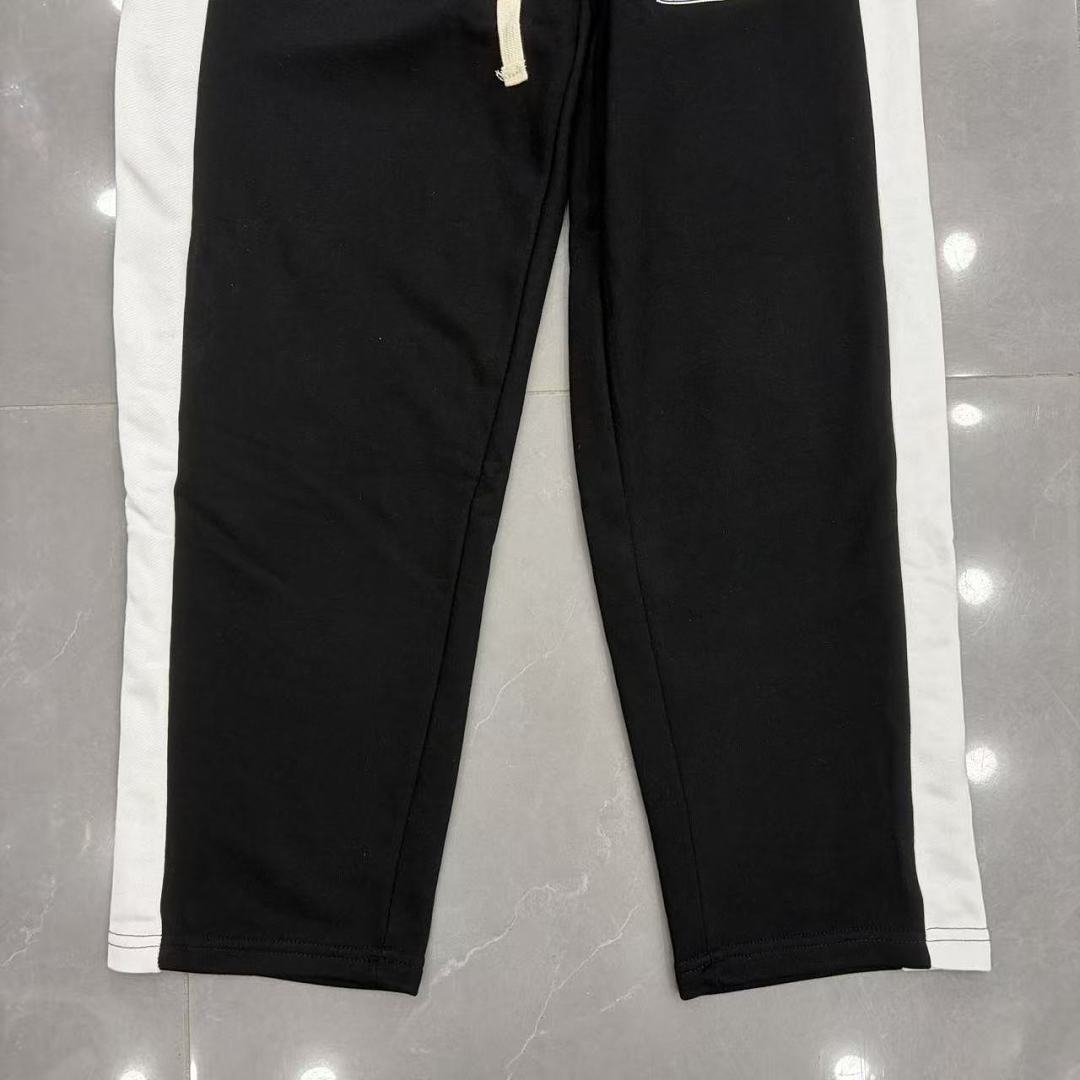 MIXED EMOTION Cross Logo Side Stripe Track Pants