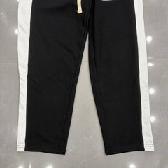 MIXED EMOTION Cross Logo Side Stripe Track Pants