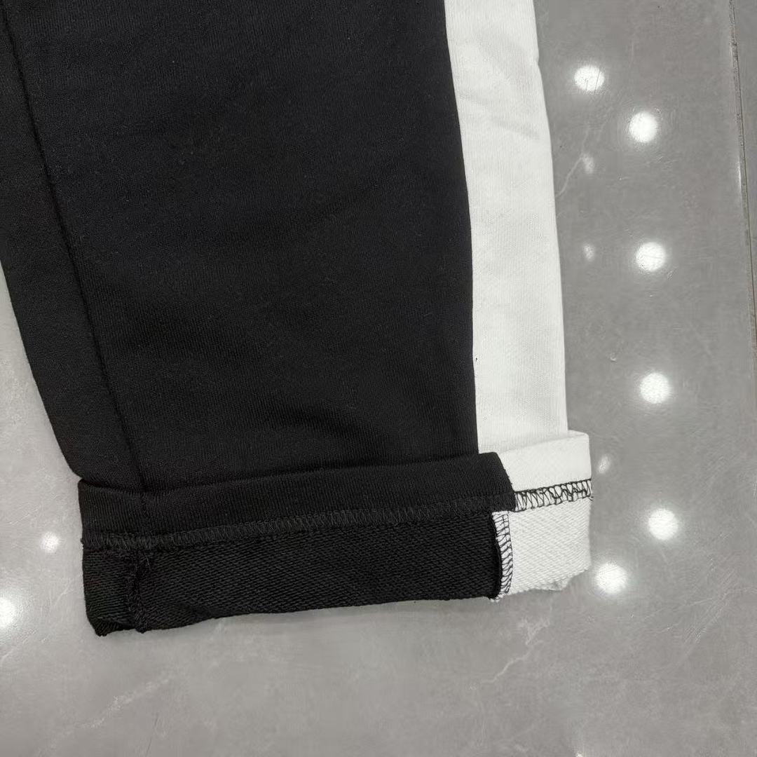 MIXED EMOTION Cross Logo Side Stripe Track Pants